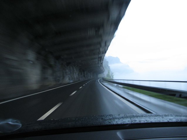 Random picture: 6:35am, the east bank of Lake Lucerne near Altdorf, Switzerland, 23 May 2012. The only hotel room left was a €560 junior suite at the Schweizerhof thanks to the World Rowing Championships. So that meant a night in the car, albeit parked beside the lake, and a very early start to avoid awkward encounters with the local police. It can never, ever fill the hole left by the 911 but our Audi A4 Avant, as intended, makes a reasonably comfortable place to sleep.