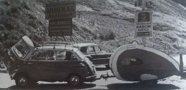 The Gotthard Pass, 1957 - It's strange the way it happens but yesterday we had cause to ponder, separately, bubble cars and micro-caravans. Suddenly, we come across a picture of both together. This BMW Isetta 600, with tandem seating, tows its tiny caravan up the Gotthard Pass at Andermatt, central Switzerland. Post war austerity was on the wane by 1957. Tastes were turning back to 'proper' cars. The bottom dropped out of the market literally overnight though, thanks to the energy crisis following Suez, the concept staggered on until the early 1960s. Picture taken from The BMW Story by Horst Mönnich.