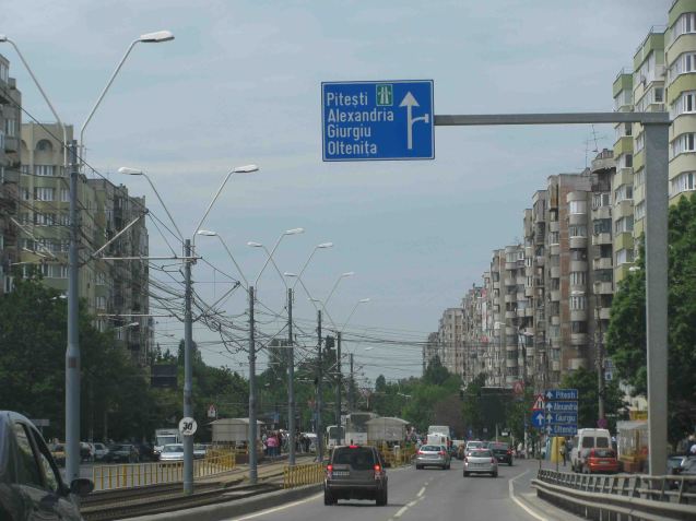 Exit through Sector 6: Bucharest is split into six administrative districts but spookily, they don’t have names just numbers. Sector 6 is in the west, roughly the direction of Pitesti. Lined both sides with the typical ‘panel’ housing blocks. Uniform - and a feature of every former eastern block country - not just out of ideology but because the concrete panels they are made from could be mass produced. Incidentally, the picture is taken just as we come off Podul Grant, a railway bridge, named after Effingham Grant, the British consul to Bucharest in the mid-19th century (and built by his son).