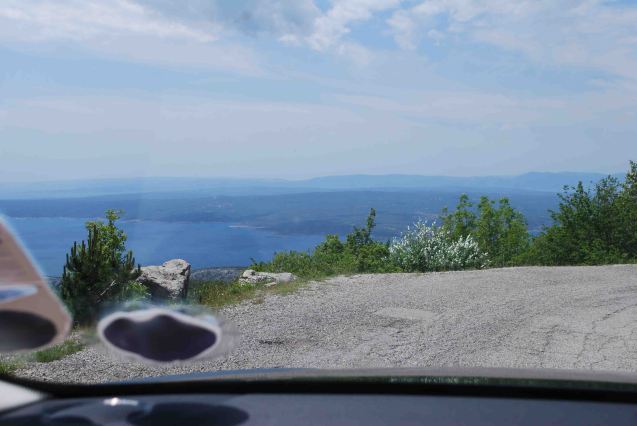First sight of the sea after crossing the Velika Kapela mountain chain in the Dinaric Alps, north west Croatia, May 2012.