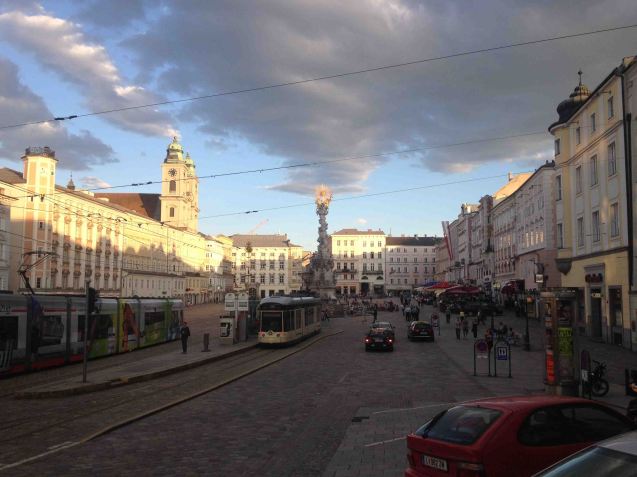 Overnight stop after 448 miles, Lovely Linz. It‘s all in the mix, of old and striking modern architecture in Autria‘s third largest city, straddling the Danube, but also in the way cars, trams and pedestrians are happy to share Hauptplatz in the city centre. Thanks to a ring-round by the Tourist Info we bag virtually the last available hotel room, at the okay Spitz ‘design’ Hotel and, thanks to cruise control, while away a long evening in this spectacular square.