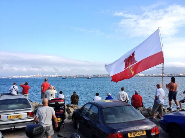 No contact was made, and nobody got hurt, but it was touch and go for a while as over thirty Spanish fishing boats, escorted by Guardia Civil vessels, faced off with their Gibraltarian counterparts this morning. Accompanied by flag waving and horn honking from the crowds assembled on the shore, Gibraltar police boats performed ‘some strong manoeuvres’ to head the Spanish boats off. They were protesting about the artificial concrete reef though they abandoned earlier plans to start trying to remove it. ‘What happens next in this ongoing row is far from clear,’ says GBC News. The three Royal Navy ships from the Response Force Task Group are due in Gibraltar Port tomorrow. Otherwise it has been a quiet day at the frontier.