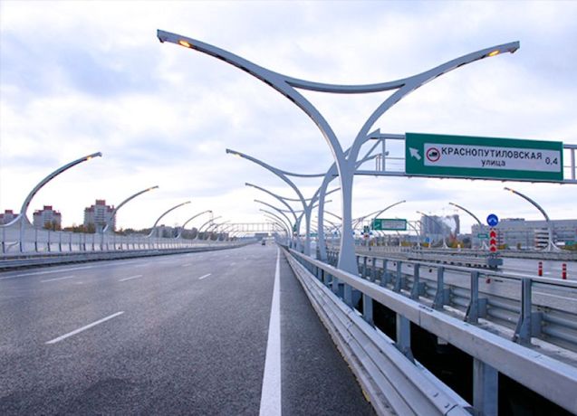 RUSSIA. It’s the Day of Roads today, the official holiday for road workers. In a congratulatory telegram, President Putin says, ‘Your work is honourable and responsible… I believe you can be proud of the results achieved.’ It’s been a busy few years what with new highways around Sochi for the 2014 Winter Olympics, advancing construction on the M11 Moscow-St Petersburg superhighway and much of the Western High Speed Diameter Road (WHSD, above) across St Petersburg recently opened. Next on the list is a massive new ring road around Moscow.