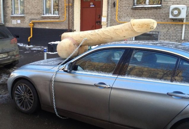 RUSSIA: perpetrators as yet unknown chained and bolted a huge phallus to the bonnet of satirical blog writer 'Perzident Roissi' - aka @KermlinRussia. 