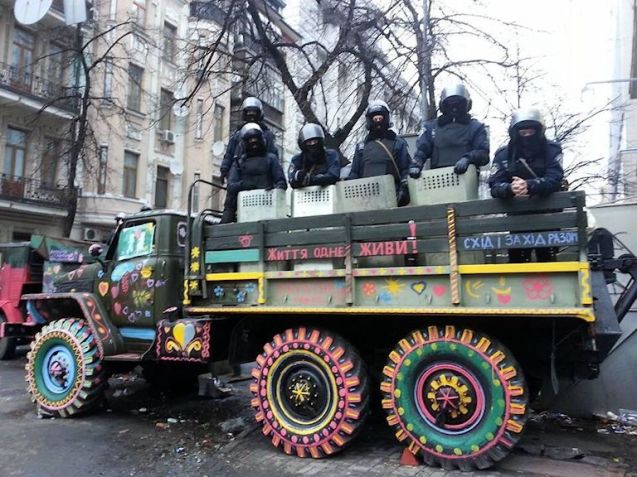 Kyiv, end in sight? Some streets have been cleared or partially cleared, including Hrushevskoho Street, scene of the most bitter confrontation recently (above). Protestors have left the city hall building and 234 have been released by the authorities under an amnesty. Meanwhile however, an Automaidan activist in Zaporizhzhya in south east Ukraine was killed at the weekend after an unknown assailant fired into the petrol tank. Most of all, protestors are keen to refute accusations that their movement is made up of (right wing) extremists. Photo via @EuromaidanPR