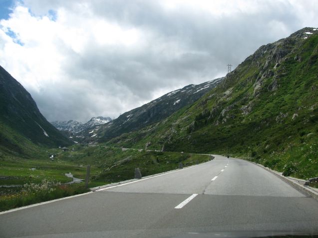 Tiny Andermatt, pop. 1400, sits in the broad, long Urseren Valley, the source of the River Reuss, the fourth longest in Switzerland, which flows down into Lake Lucerne and, eventually, the Rhine and North Sea. East from Andermatt is Oberlap Pass (8%, 2045m) to Graubunden while south is the Gotthard Pass (10%, 2091m) down to Airolo, the most northerly town in Ticino, the Italian-speaking part of the country.