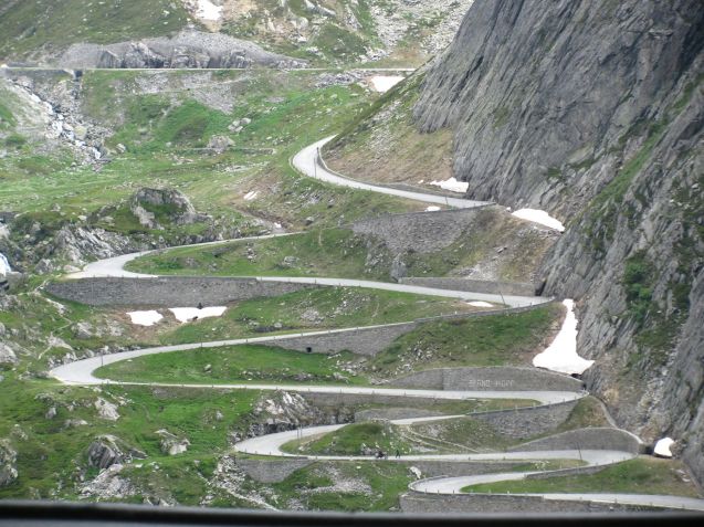 Cobble-paved in parts and considerably tighter, twistier and steeper than the official Gotthard Pass, Tremola winds its way around the new road, eventually plunging dramatically down the side of Pizzo Centrale (2,999m). To the west is Pizzo Lucendro (2963m) both Lepontine Alps, part of the Western Alps.