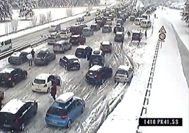 'Picture of the day,' said @TRAFvacances. Rescue efforts hampered by drivers stopping by the side of the road to fit snow chains. But what choice did they have?