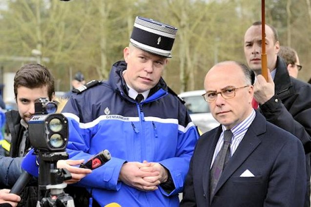 Interior minister Bernard Cazeneuve, right. Photo @Place_Beauvau