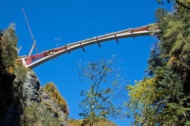 Switzerland’s dizzingly high Taminabrucke is on schedule to open next year. The new bridge towers more than 650ft above the arm-span-at-its-narrowest Tamina Gorge, hence the name, and is set to become a tourist attraction in its own right when complete. It’s just off the A13 near Chur in east Switzerland. Watch the construction live on the webcam at Taminabruecke.ch