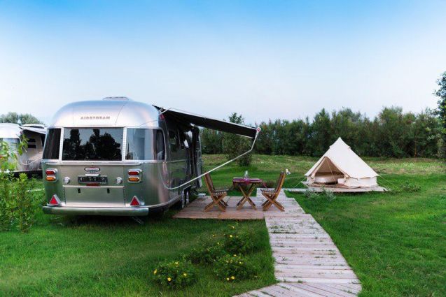 Airstream aluminium caravans start at €72,775 to buy (+ VAT) so it is no surprise that Italy’s first holiday park devoted to the iconic American trailer works out a bit pricey too. Even so gobs were smacked to hear the per night prices at Camping Ca' Savio near Venice begin at €125 (and go up to €180). Okay, that includes a tent for the kids, an awning and wooden deck with table and chairs - and bed linen, towels and air conditioning - all ‘a few steps’ from the beach. But there’s a minimum three night stay plus a €45 cleaning charge. Having said all that, the site is just an hour’s drive from Venice, or 5km from a water taxi which drops near the Doge’s Palace after a 40 minute ride according to Glossy Glamping.
